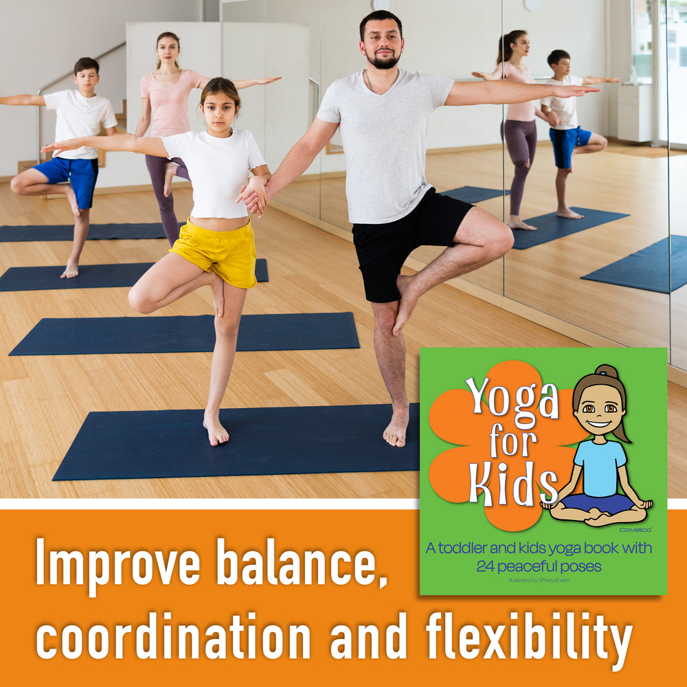 Group of people, including children and adults, practicing yoga in a studio with a book titled 'Yoga for Kids' displayed.